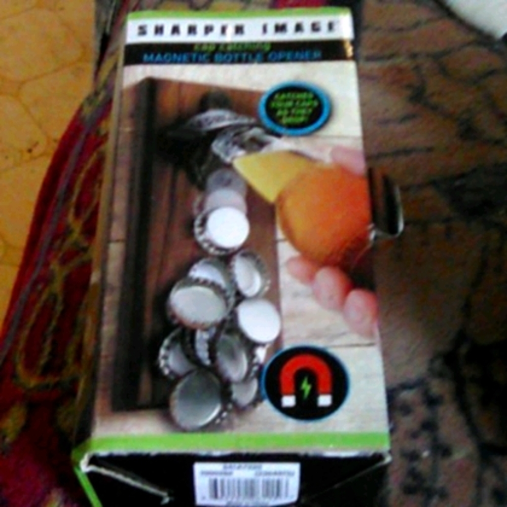 Sharper image magnetic bottle opener